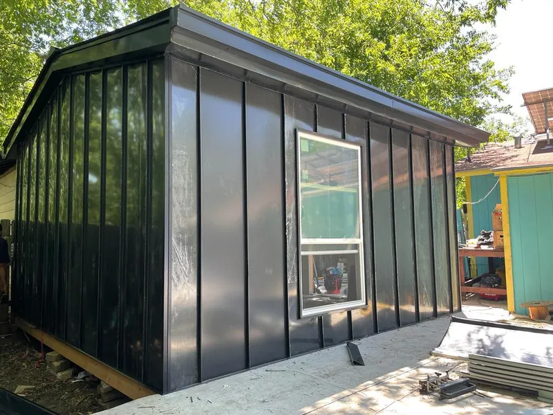 Black standing seam metal wall panels for Metal Roof Installation in Acton